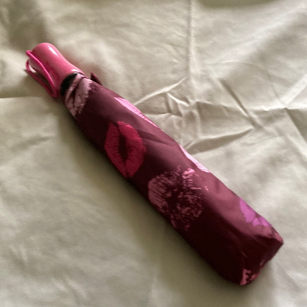 Avon cancer awareness umbrellas brand new 20 dollars each